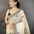 Cream cotton woven design saree with unstitched blouse piece