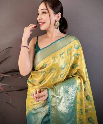 Yellow kanjeevaram silk blend woven design saree with unstitched blouse piece 1