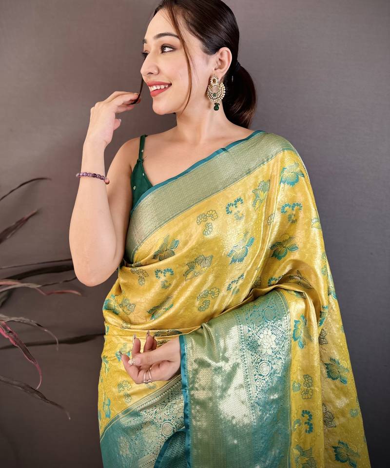 Yellow kanjeevaram silk woven design saree with unstitched blouse piece