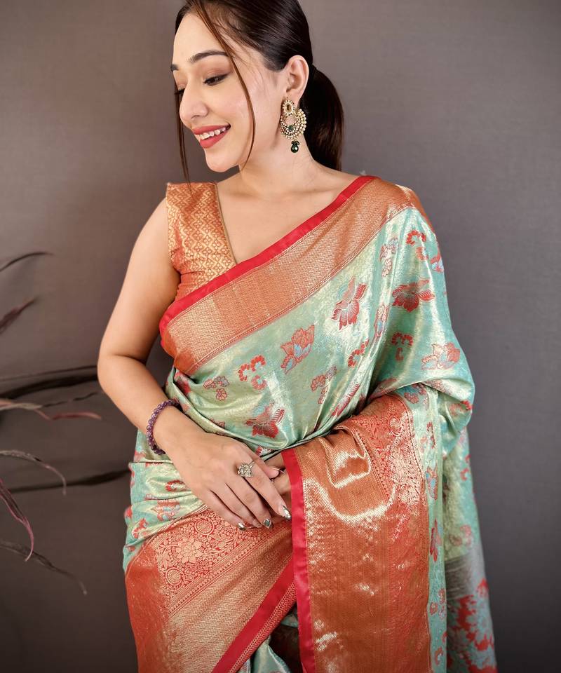 Sea green kanjeevaram silk woven design saree with unstitched blouse piece