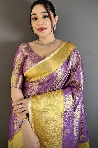 Purple kanjeevaram silk blend woven design saree with unstitched blouse piece