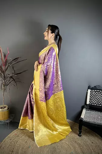 Purple kanjeevaram silk blend woven design saree with unstitched blouse piece