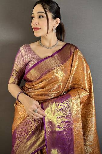 Orange kanjeevaram silk blend woven design saree with unstitched blouse piece