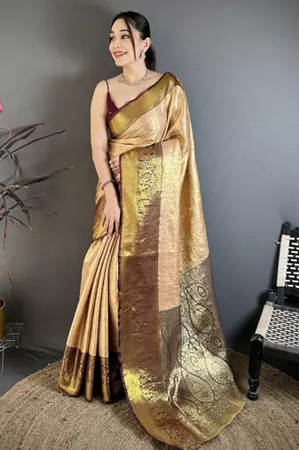 Beige kanjeevaram silk blend woven design saree with unstitched blouse piece