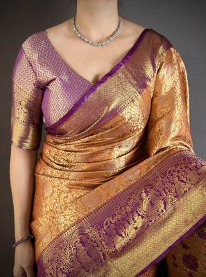 Orange kanjeevaram silk blend woven design saree with unstitched blouse piece 4