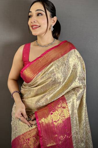 Cream kanjeevaram silk blend woven design saree with unstitched blouse piece