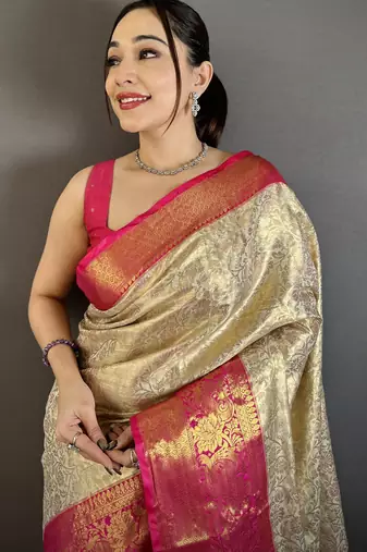 Cream kanjeevaram silk blend woven design saree with unstitched blouse piece