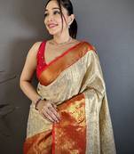 Cream kanjeevaram silk blend woven design saree with unstitched blouse piece