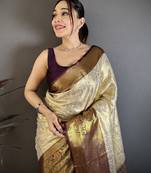 Cream kanjeevaram silk blend woven design saree with unstitched blouse piece