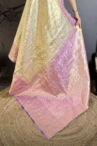 Cream kanjeevaram silk blend woven design saree with unstitched blouse piece