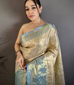 Cream kanjeevaram silk blend woven design saree with unstitched blouse piece
