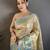 Cream kanjeevaram silk blend woven design saree with unstitched blouse piece