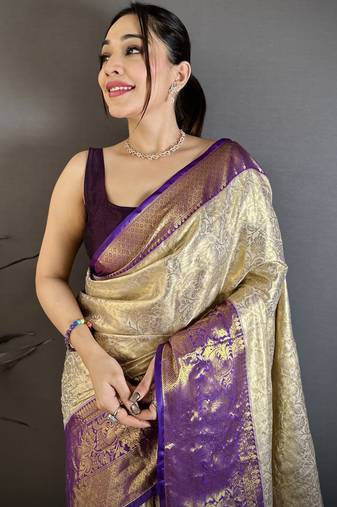 Cream kanjeevaram silk blend woven design saree with unstitched blouse piece