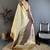 Cream kanjeevaram silk blend woven design saree with unstitched blouse piece