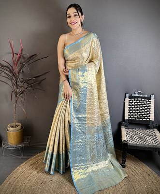 Cream kanjeevaram silk blend woven design saree with unstitched blouse piece 2