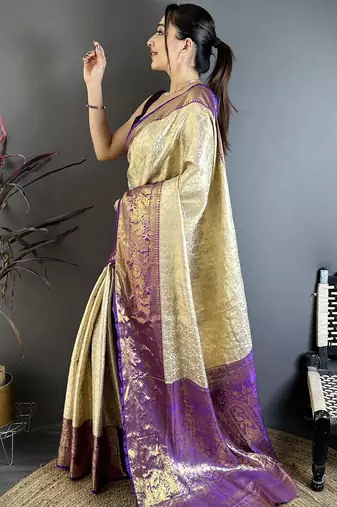 Cream kanjeevaram silk blend woven design saree with unstitched blouse piece