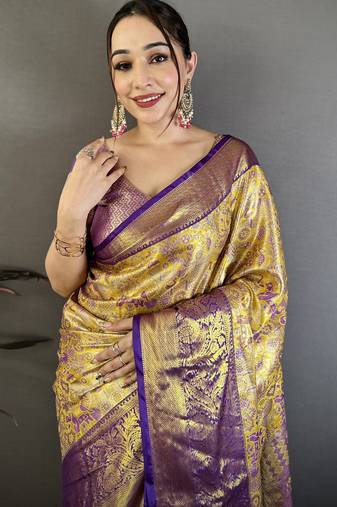 Gold kanjeevaram silk blend woven design saree with unstitched blouse piece