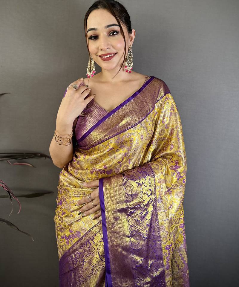 Gold kanjeevaram silk blend woven design saree with unstitched blouse piece