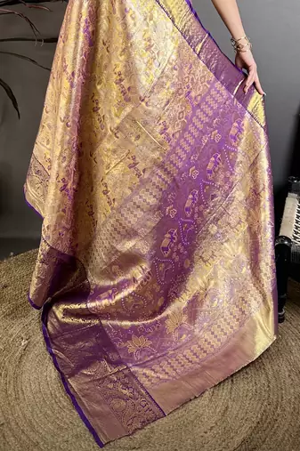 Gold kanjeevaram silk blend woven design saree with unstitched blouse piece