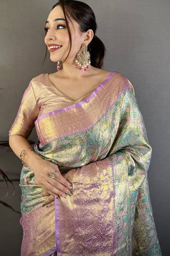 Sea green kanjeevaram silk blend woven design saree with unstitched blouse piece