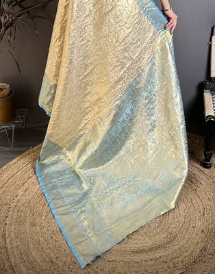 Cream kanjeevaram silk blend woven design saree with unstitched blouse piece 5