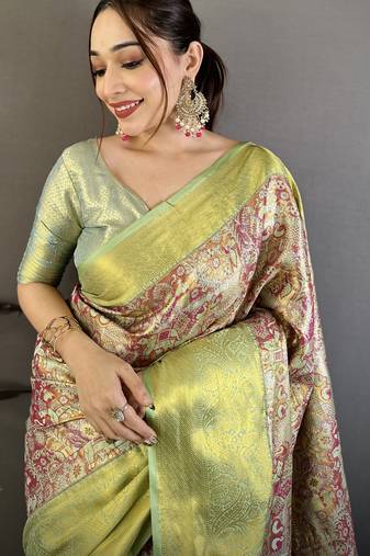 Green kanjeevaram silk blend woven design saree with unstitched blouse piece