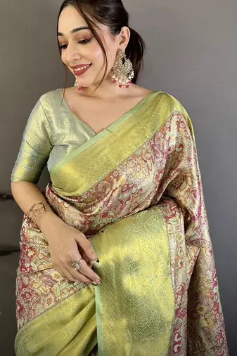 Green kanjeevaram silk blend woven design saree with unstitched blouse piece
