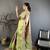 Green kanjeevaram silk blend woven design saree with unstitched blouse piece