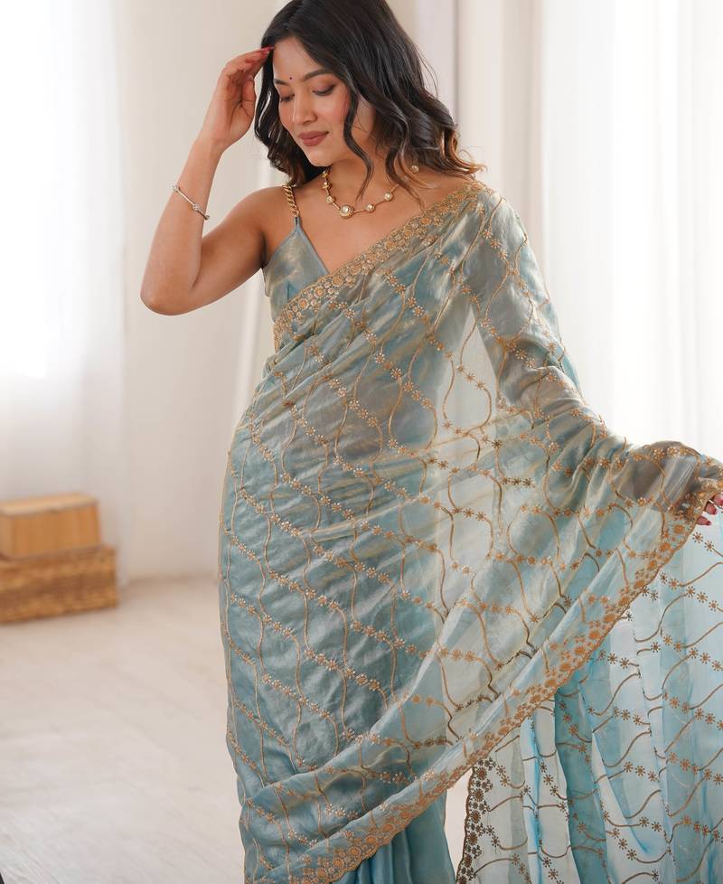 Sky blue tissue embridered saree with unstitched blouse piece