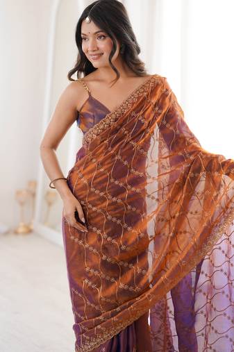 Rust tissue embridered saree with unstitched blouse piece