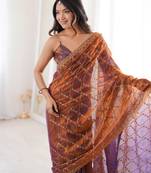 Rust tissue embridered saree with unstitched blouse piece