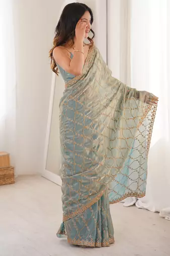Sky blue tissue embridered saree with unstitched blouse piece