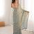 Sky blue tissue embridered saree with unstitched blouse piece