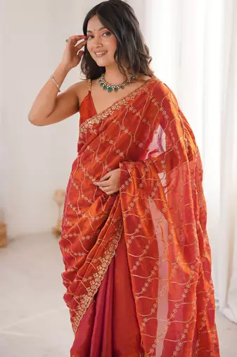 Orange tissue embridered saree with unstitched blouse piece