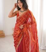 Orange tissue embridered saree with unstitched blouse piece