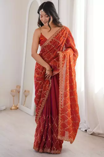 Orange tissue embridered saree with unstitched blouse piece