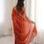 Orange tissue embridered saree with unstitched blouse piece