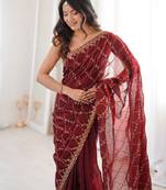 Maroon tissue embridered saree with unstitched blouse piece