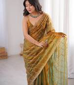 Gold tissue embridered saree with unstitched blouse piece