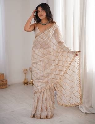 Cream tissue embridered saree with unstitched blouse piece 2