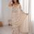 Cream tissue embridered saree with unstitched blouse piece