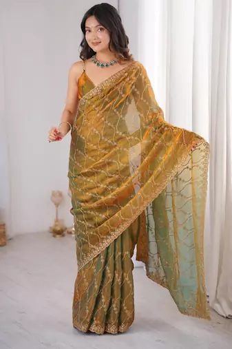 Gold tissue embridered saree with unstitched blouse piece