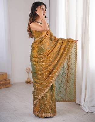 Gold tissue embridered saree with unstitched blouse piece 3