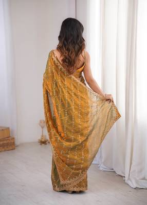 Gold tissue embridered saree with unstitched blouse piece 4