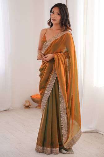 Gold tissue embridered saree with unstitched blouse piece