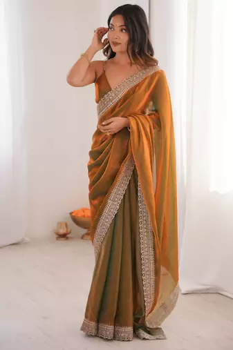 Gold tissue embridered saree with unstitched blouse piece