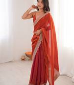 Orange tissue embridered saree with unstitched blouse piece