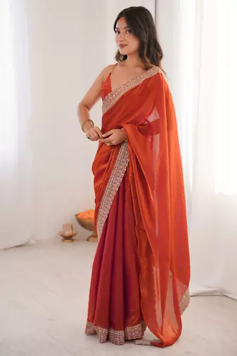 Orange tissue embridered saree with unstitched blouse piece