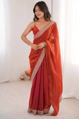 Orange tissue embridered saree with unstitched blouse piece