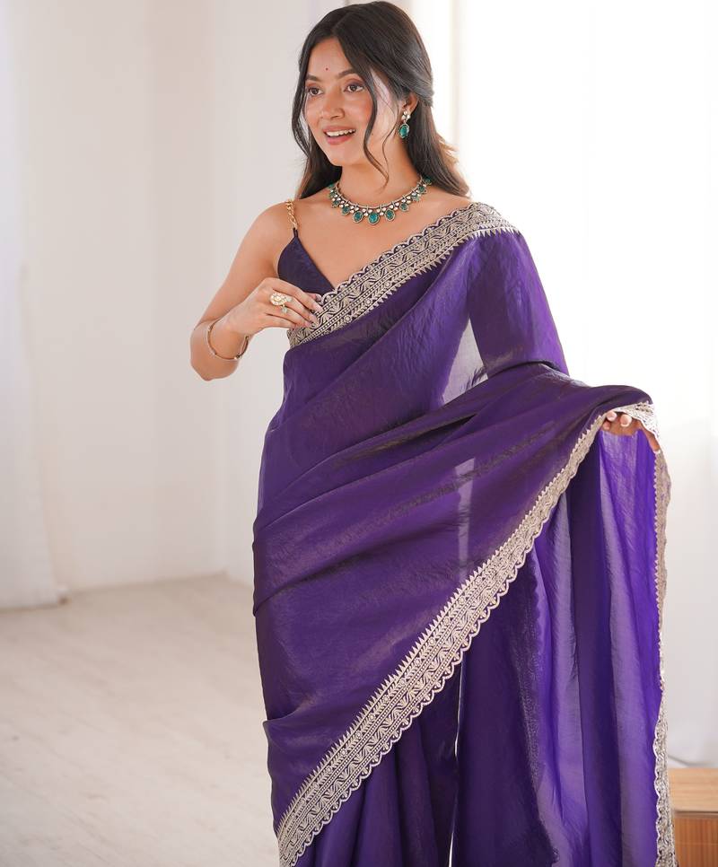 Purple tissue embridered saree with unstitched blouse piece